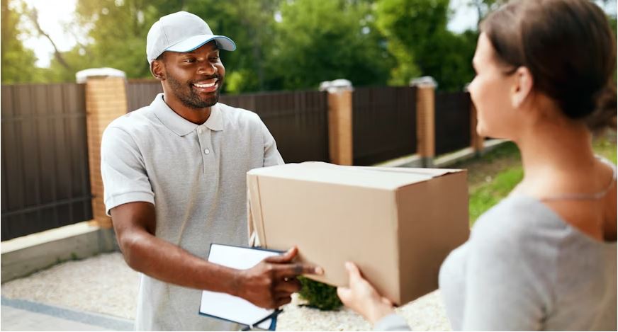 Professional delivery service - The Runner courier handing package to satisfied customer